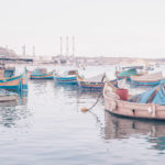 Harbor in Marsaxlokk, Malta. More about fishermen village on www.atasteoffun.com